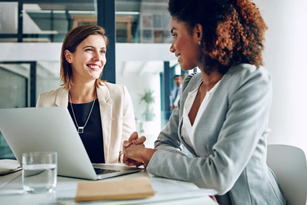 Two women talking to each other