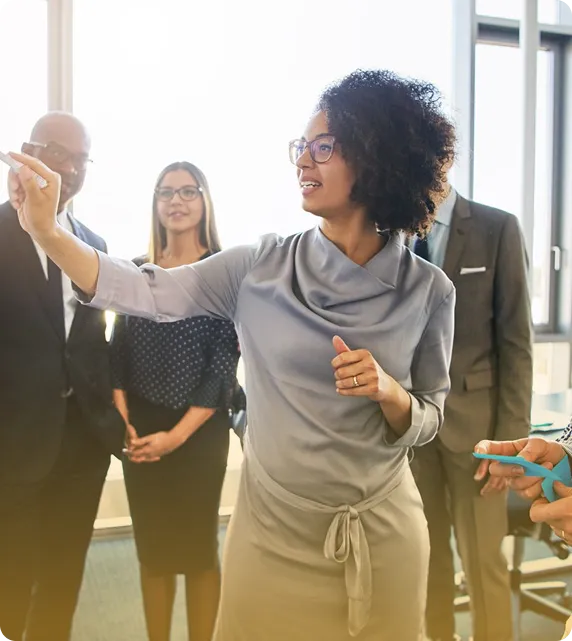 Person writing on a whiteboard